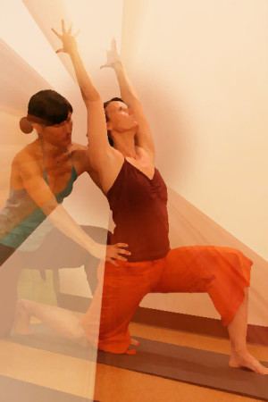 YogaTeacherAssisting a student